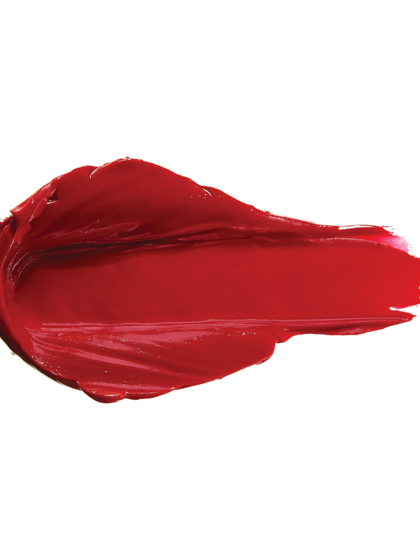 A thick smear of rich cherry red Nopal matte lipstick on white, with a smooth centre and raised, creamy ridges around the edges.
