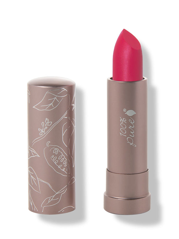 100% Pure Protea matte lipstick with a slanted raspberry pink tip extended from a taupe tube; its matching cap stands beside it with white botanical line drawings.
