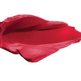 A thick smear of raspberry pink Protea matte lipstick on white, with a smooth centre and raised, creamy ridges around the edges.
