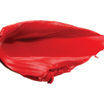 A thick smear of bright scarlet red Sonora matte lipstick on white, with a smooth centre and raised, creamy ridges around the edges.