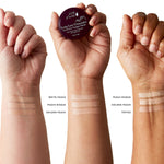 Three forearms with light, medium and dark skin each show three beige to tan concealer stripes. Labels identify White Peach, Peach Bisque, Golden Peach and Toffee. The middle hand holds a Long Last Concealer pot with a burgundy lid.