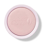 A close view of pearly pink Moonstone Glow luminiser in a round pale pink compact, with the 100% Pure logo embossed across the powder.