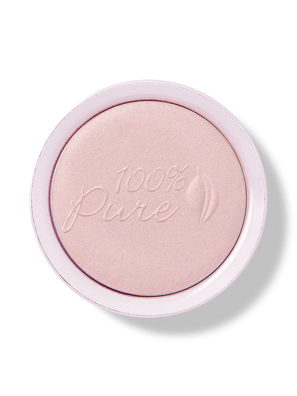 A close view of pearly pink Moonstone Glow luminiser in a round pale pink compact, with the 100% Pure logo embossed across the powder.