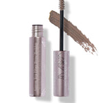 Soft Brown Green Tea Fibre Brow Builder: an open metallic pink tube and a small spiral brush in front of a soft brown brushstroke. Fine white botanical drawings decorate the wand cap.