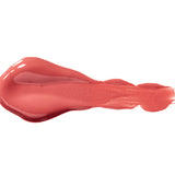 Ganache 100% Pure Lip Caramel swatch: thick, glossy rosy pink liquid lipstick spread into an elongated smear, with raised ridges and a tapering streak at one end.
