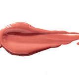 Rum Nougat 100% Pure Lip Caramel swatch: thick, glossy peach-rose liquid lipstick spread into an elongated smear, with raised ridges and a tapering streak at one end.