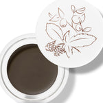 100% Pure Long Last Brows in Medium Brown: an open white pot filled with dark brown brow cream. A fine drawing of leaves and berries decorates the white lid resting behind the pot.
