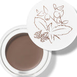 100% Pure Long Last Brows in Soft Brown: an open white pot filled with muted rosy brown brow cream. A fine drawing of leaves and berries decorates the white lid resting behind the pot.