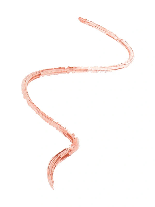A thin peach-brown lip-liner swatch forms a tall wavy line on white. Fine parallel strokes and a lightly broken edge reveal the pencil texture.