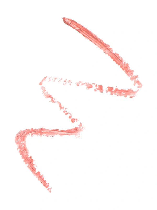 A coral-pink lip-liner swatch forms a loose zigzag on white. The stroke is thicker at the upper end, with grainy, broken edges around the bends.