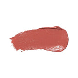 A horizontal swatch of Bee Balm lipstick in warm rosy pink, with a softly glossy surface, a rounded end and fine brush marks at the opposite edge.