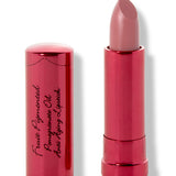 Buttercup lipstick with a slanted dusty rose tip extended from a metallic pink tube; its matching cap with black cursive lettering stands beside it.