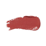 A horizontal swatch of Foxglove lipstick in muted rose brown, with a softly glossy surface, a rounded end and fine brush marks at the opposite edge.