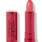 Magnolia lipstick with a slanted bright coral pink tip extended from a metallic pink tube; its matching cap with black cursive lettering stands beside it.