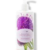 A white pump bottle of 100% Pure Burdock and Neem Healthy Scalp Conditioner has a large purple thistle and green leaves behind a pale pink oval label. The white pump points to the right.