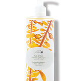 100% Pure Kelp & Mint Volumising Shampoo in a clear bottle of pale golden liquid, with a white pump, golden kelp imagery and a pale green round label.