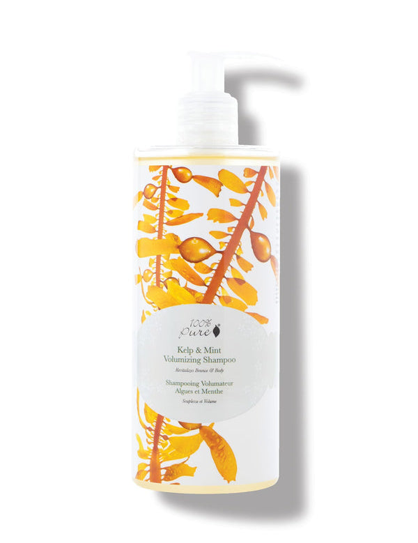 100% Pure Kelp & Mint Volumising Shampoo in a clear bottle of pale golden liquid, with a white pump, golden kelp imagery and a pale green round label.