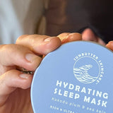 SunButter Hydrating Sleep Mask held in hand