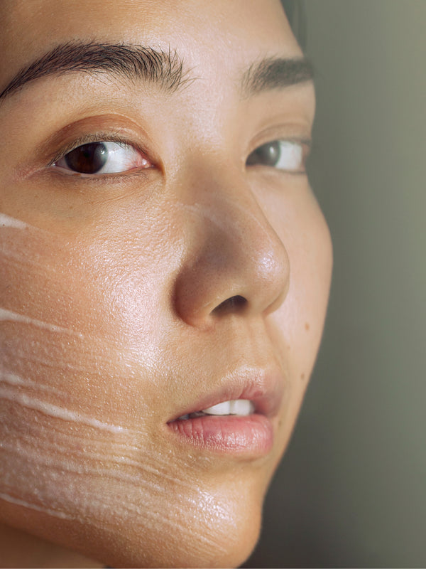 Model wearing Madara Peel Brightening AHA Peel Mask