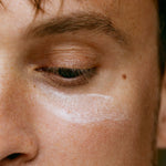 Model applying Madara SMART Anti-Fatigue Eye Rescue Cream