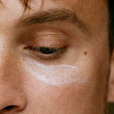 Model applying Madara SMART Anti-Fatigue Eye Rescue Cream