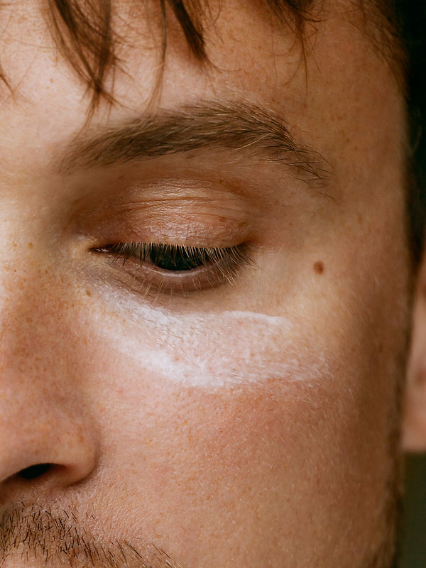 Model applying Madara SMART Anti-Fatigue Eye Rescue Cream