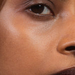 Model wearing Madara H2O Tint Hyaluron Tinted Serum