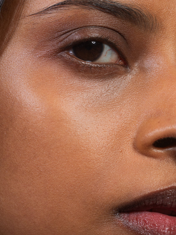 Model wearing Madara H2O Tint Hyaluron Tinted Serum