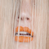 Model using Madara Feed Repair Dry Rescue Hair Mask