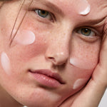 Model applying Madara SOS+ Sensitive Night Cream