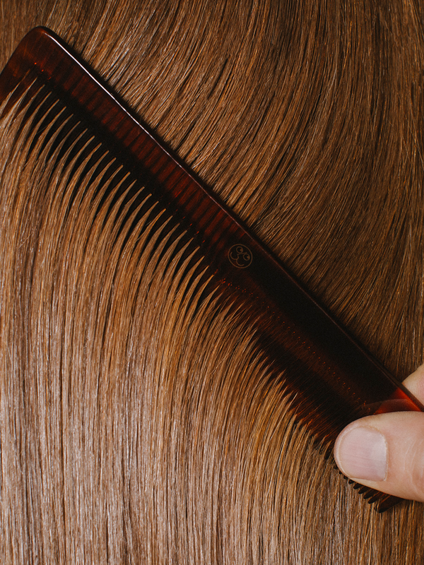 Model with smooth hair after Madara Silk Micro-Keratin Hair Mist
