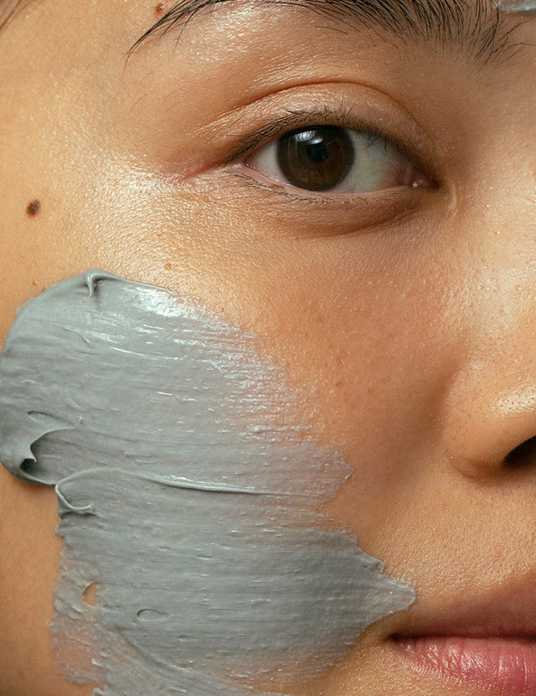Model wearing Madara Peel Creamy Clay AHA Clay Mask