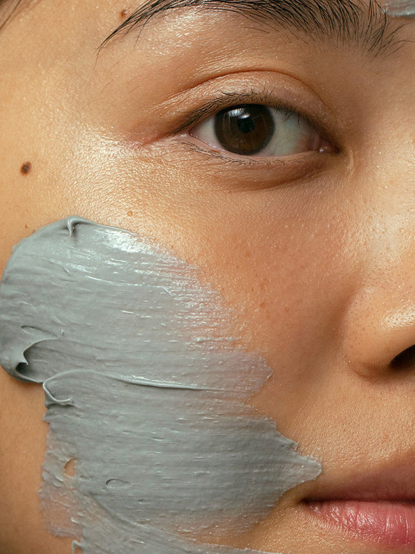 Model wearing Madara Peel Creamy Clay AHA Clay Mask