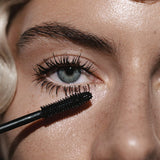 Model wearing Madara Bold Volume Mascara in Deep Matter