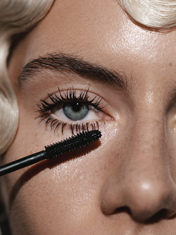 Model wearing Madara Bold Volume Mascara in Deep Matter