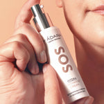 Model applying Madara SOS Hydra Recharge Cream