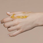 Swatch of Mukti Deep Cleanse Enzyme Mask on the back of a hand