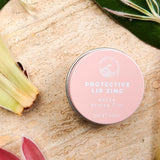 SunButter Protea Tint Protective Lip Zinc styled with flowers