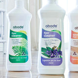Set of three Abode floor cleaners including Timber Floor Cleaner Atlas Cedar on a timber floor