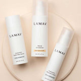 Three white bottles of LAMAV Hydration Skin Discovery Pack (3 Pack), featuring hyaluronic acid-powered formulas for ultimate hydration, arranged on a beige circular surface against a neutral background.