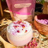 She BANG! Peri Latte Rose & Vanilla styled with rose petals and botanicals