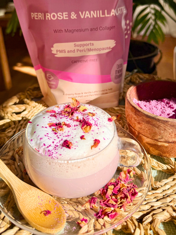 She BANG! Peri Latte Rose & Vanilla styled with rose petals and botanicals