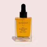 Mud Organics Sea Buckthorn Serum 30ml on a soft blush background