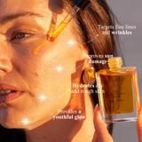 Woman applying Mud Organics Sea Buckthorn Serum to her face in warm sunlight