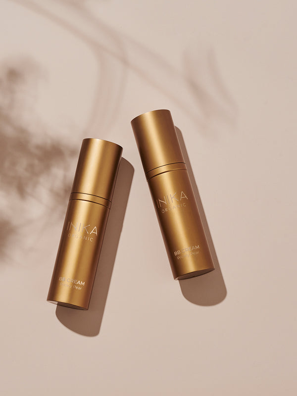 Model applying INIKA Organic BB Cream