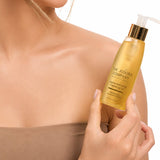 Woman holding The Jojoba Company Jojoba Activating Cleansing Oil