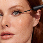 Model wearing INIKA Organic Liquid Eyeliner in Black