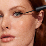 Model wearing INIKA Organic Liquid Eyeliner in Black