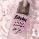 Model applying Raww Light Beam Radiance Serum