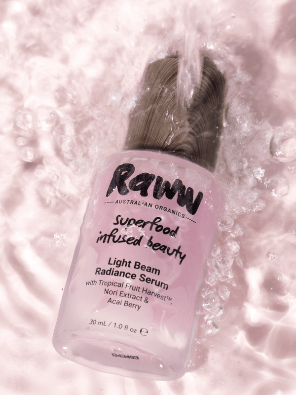 Model applying Raww Light Beam Radiance Serum